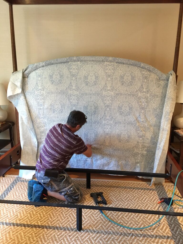 Before. On-site installed custom upholstered headboard, proportioned to align with detailed architectural millwork and integrated window treatments.
