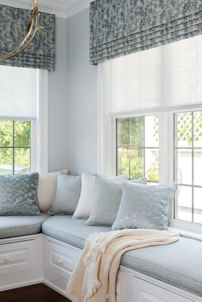 Custom Roman shades and perfectly tailored window seat cushion creating a cohesive story for Liz Walton Home project