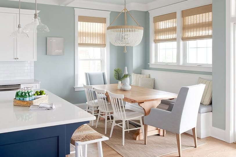 Eco-friendly woven wood shades with decorative banding and motorization, designed for Barbara Straub