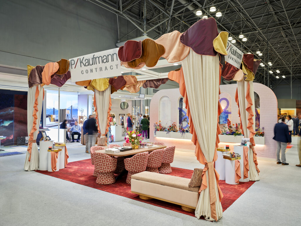 Vitalia Inc BDNY 2025 booth with custom sheer draperies and petals