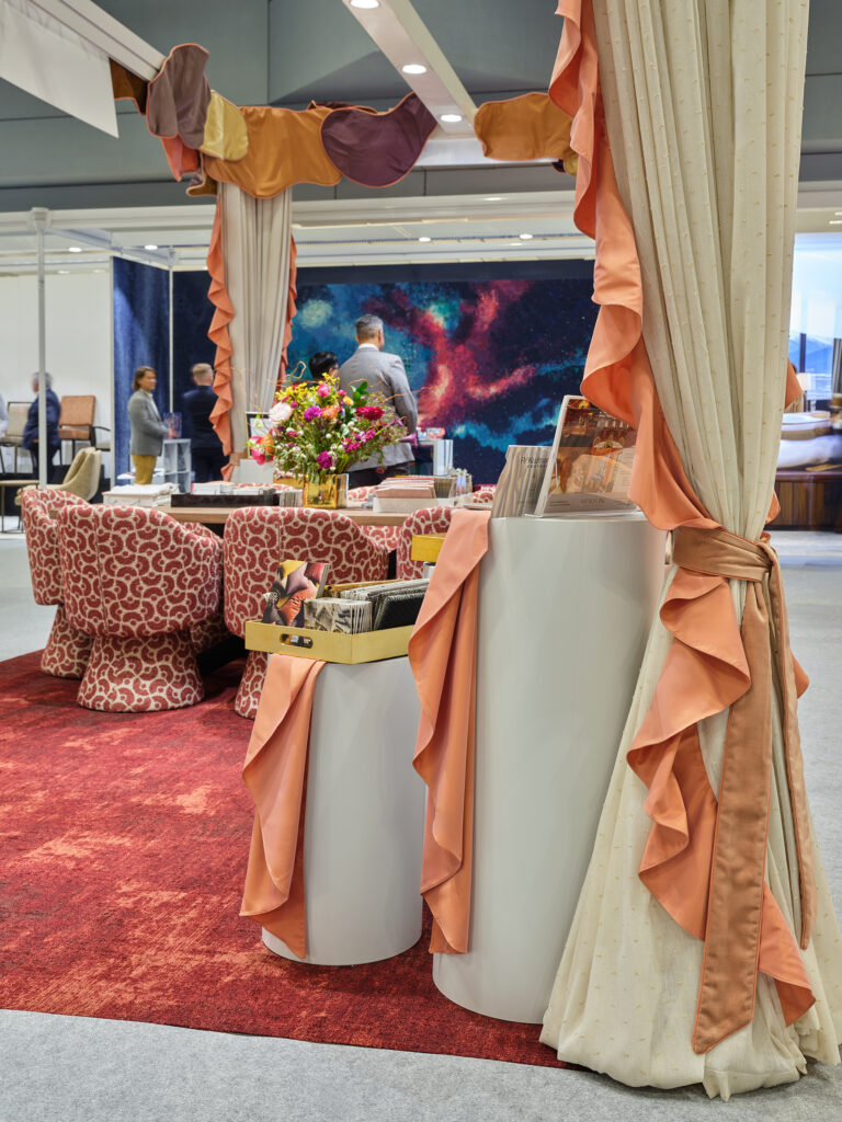 Close-up of layered sheers and sculptural petals in P/Kaufmann booth