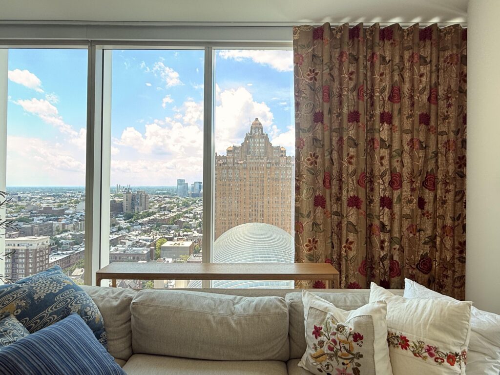 Bold floral ripple fold custom drapery panels in a Philadelphia high-rise, fabricated and installed by Vitalia Inc. in collaboration with Michael Shannon Designs
